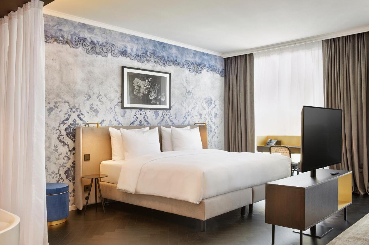 Hyperion Hotel Salzburgo Exterior foto A bedroom at the hotel