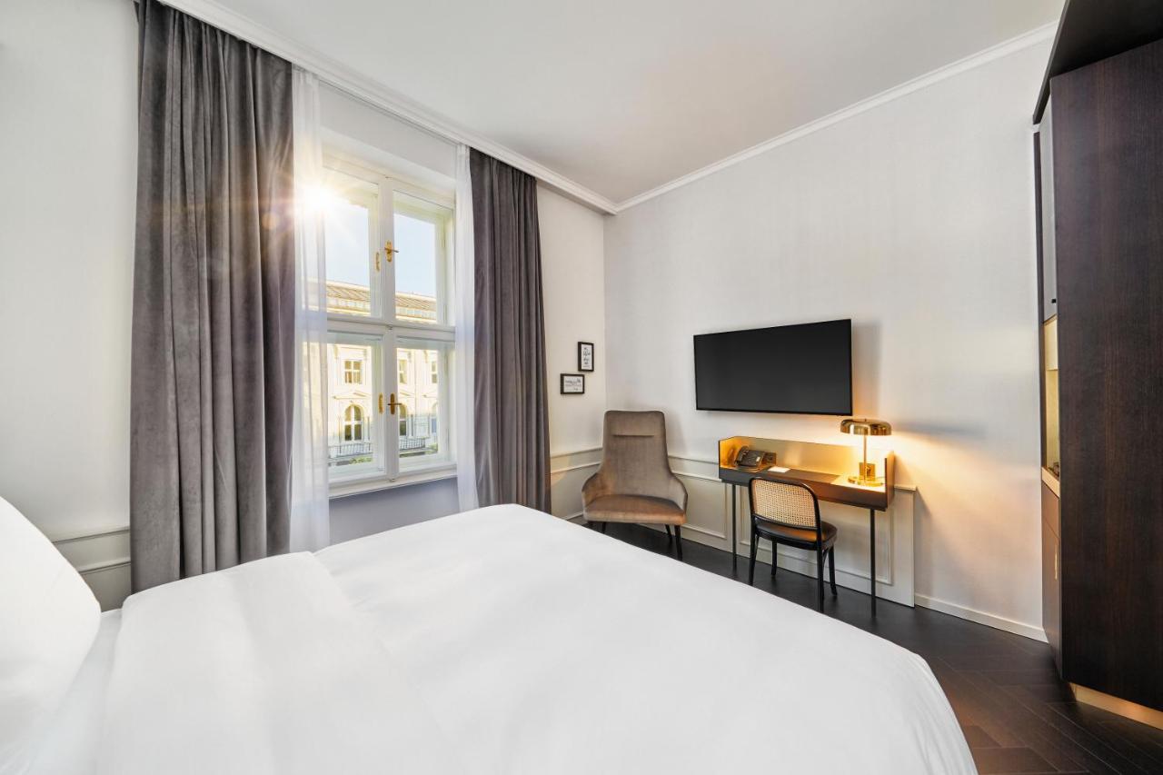 Hyperion Hotel Salzburgo Exterior foto A room at the hotel